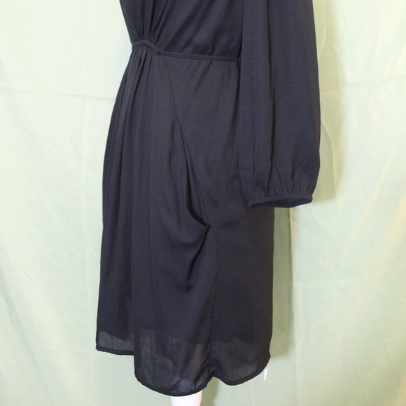 Flattering Black Baby Doll Dress - Picture 5 of 14